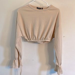 New with tags nasty gal cream cropped sweater with ties on sleeve